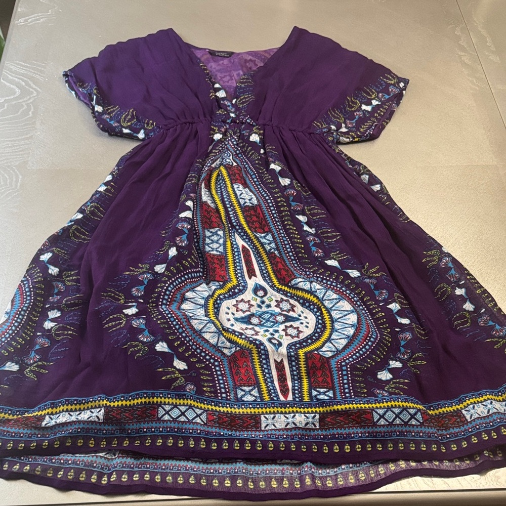 Vibrant Purple Kids Dress with Colorful Patterns